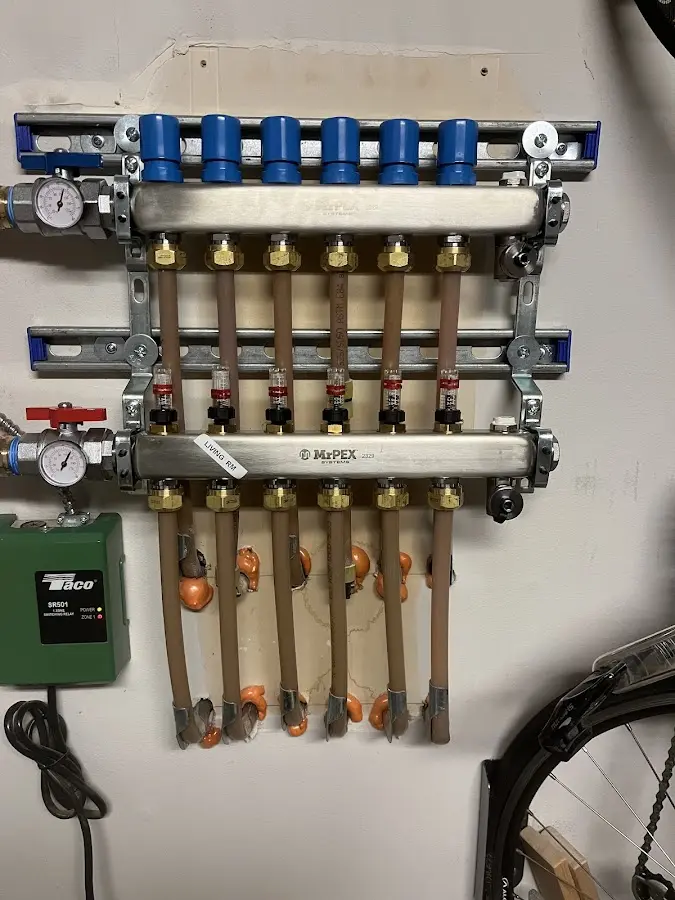 Plumber performing Water Heater Repair at a residential property in Whitefish